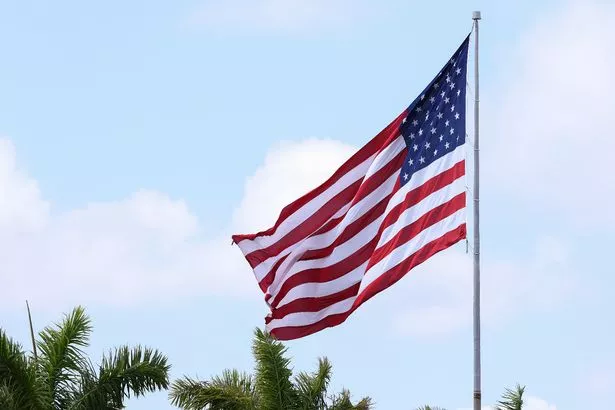 The United States of America flag on a flagpole.
