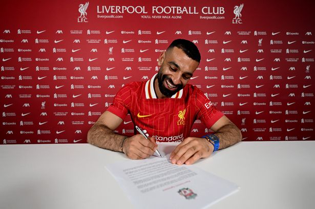LIVERPOOL, ENGLAND - APRIL 11: (THE SUN OUT, THE SUN ON SUNDAY OUT) Mohamed Salah of Liverpool signs a new contract extension at Anfield on April 11, 2025 in Liverpool, England. (Photo by Andrew Powell/Liverpool FC via Getty Images)