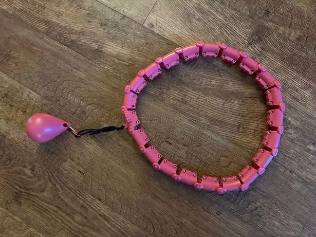 Weighted hula hoops have become increasingly popular on FitTok and are a celebrity workout essential