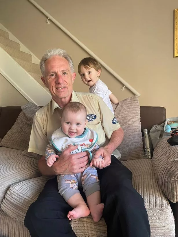 Perry Wilson, with grandchildren, Eden and Roman