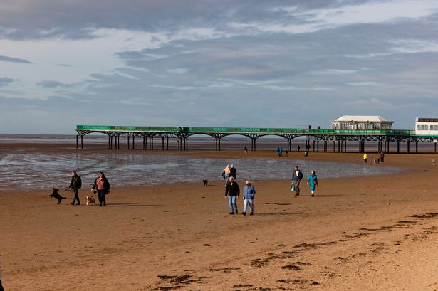 The huge beach at St Anne's with the pier in the distance 