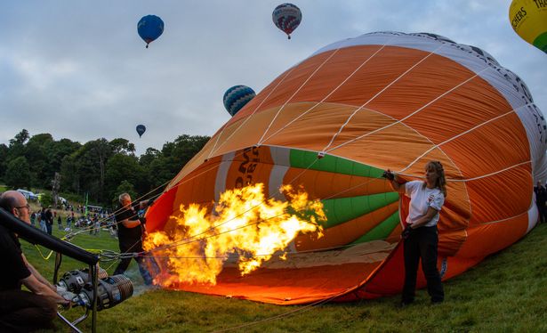 Hot air balloons take to the sky early this morning, Saturday 10 August 2024, on the second day of the Bristol International Balloon Fiesta at Ashton Court.  just over 60 balloons lifted off and made their way north over the city.      PHOTO:PAUL GILLIS / Reach Plc