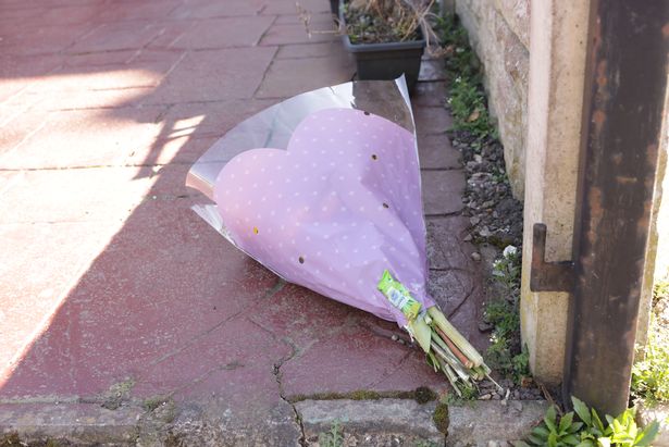 Flowers placed on the driveway