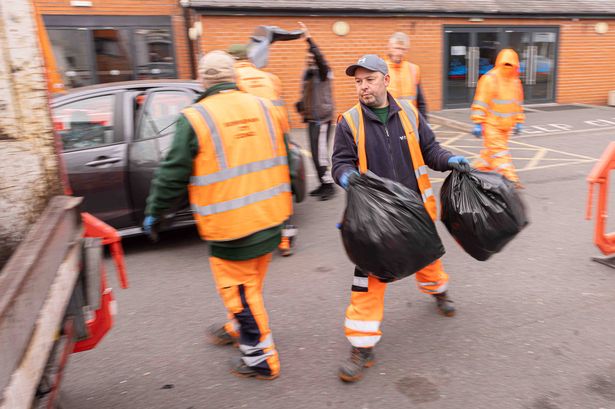 Birmingham City Council workers at a Mobile Household Waste Centre at Green Lane Mosque in Small Heath, Birmingham
