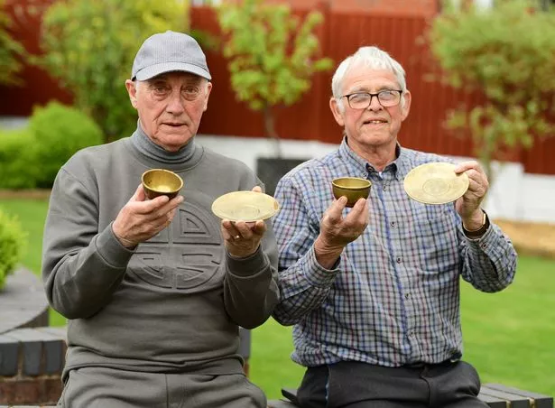 Brothers Jimmy and Eddie Willis, with what they believe to be ancient Chinese vessels.