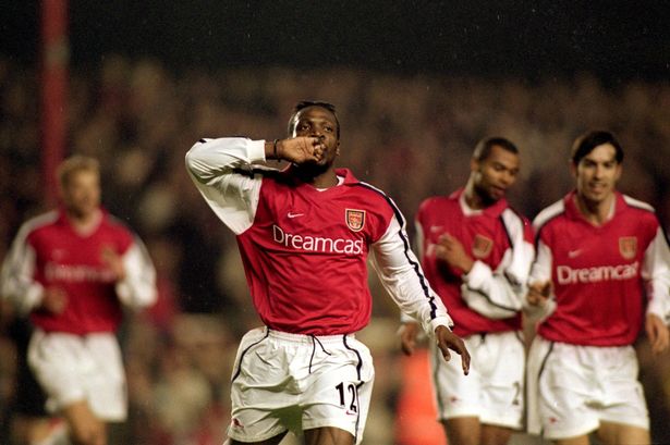 30 Jan 2001:  Lauren of Arsenal celebrates scoring the second goal of the match during the FA Carling Premiership match against Bradford City played at Highbury, in London. Arsenal won the match 2-0. \ Mandatory Credit: Mike Hewitt /Allsport
