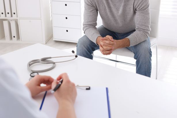 Man having appointment with STD specialist in clinic (stock image)