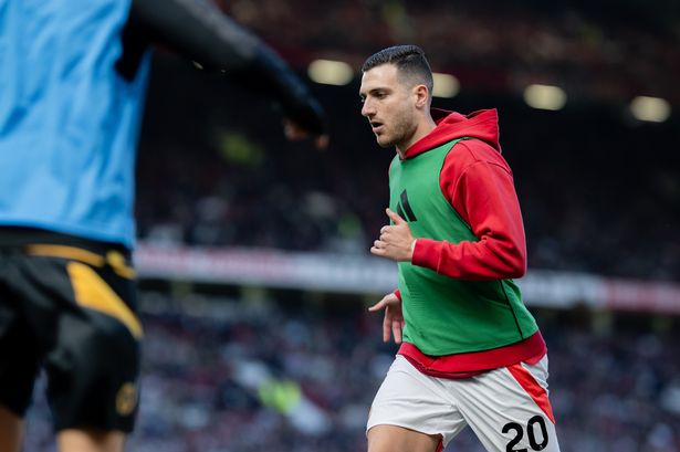 Diogo Dalot warms up during the Premier League match between Manchester United FC and Wolverhampton Wanderers FC at Old Trafford. 