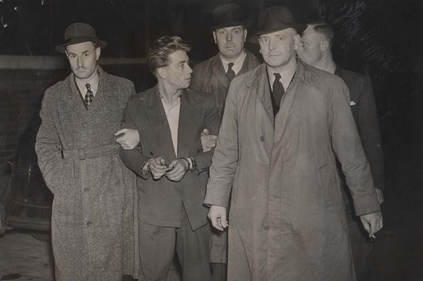 Edward Devlin with detectives after his arrest for the murder of Beatrice Alice Rimmer