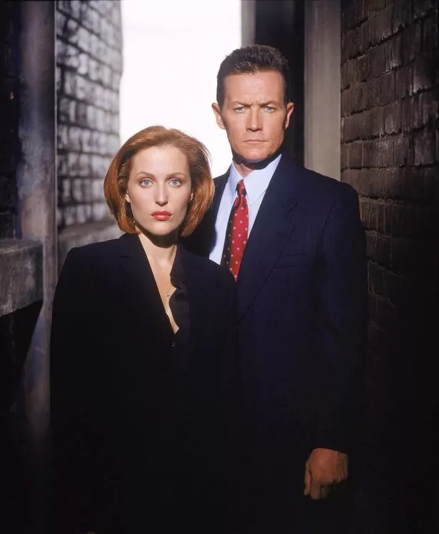 Robert Patrick as Agent John Doggett and Gillian Anderson as Agent Dana Scully.

