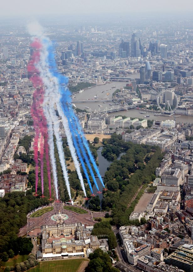 A tri-service flypast takes place down The Mall and over Buckingham Palace in 2023.