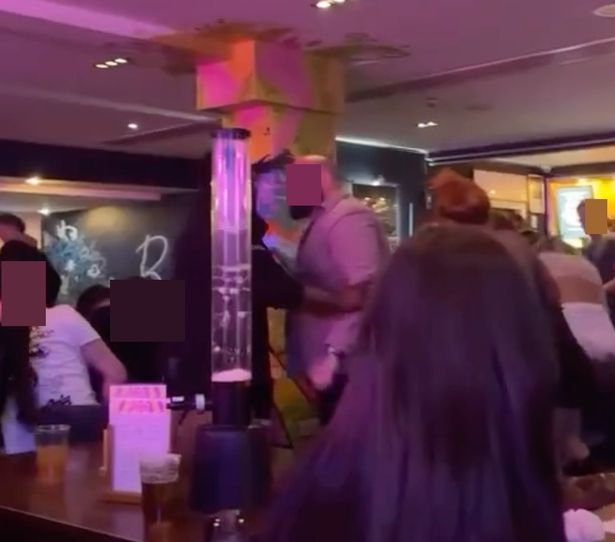 The men appear aggressive in the footage.