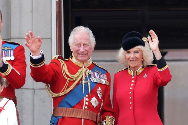  King Charles III and Queen Camilla wave alongside Prince William, Prince of Wales, Prince Louis of Wales, Catherine, Princess of Wales and Prince George of Wales on the Buckingham Palace balcony during Trooping the Colour on June 17, 2023