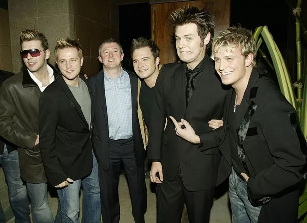 Westlife - Mark Feehily, Nicky Byrne, Shane Filan, Bryan McFadden, Kian Egan - with Louis Walsh.
