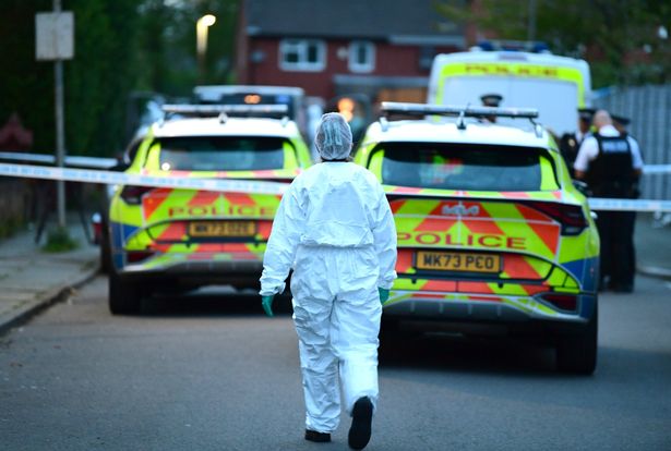 Forensic police at the scene on Windsor Road, Tuebrook