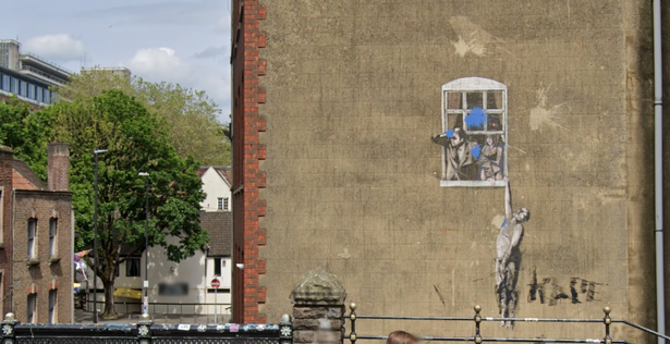 Banksy's 'Well Hung Lover' on Park Street