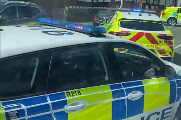 Police and ambulance crews on Lloyd Street in West Bromwich