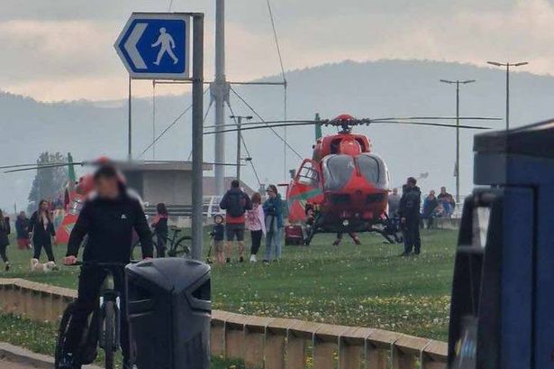 Two Wales Air Ambulance helicopters on Rhyl prom