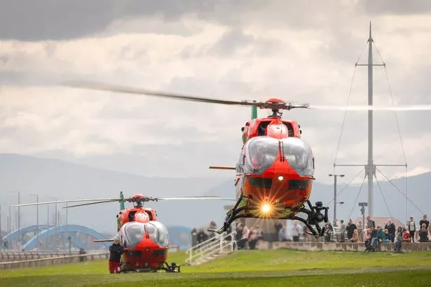Picture by Steve Morris of two Wales Air Ambulance helicopters on the prom at Rhyl on Saturday afternoon