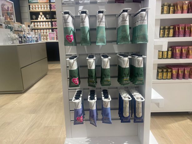 This photo shows hand creams on a shelf in Bath & Bodyworks
