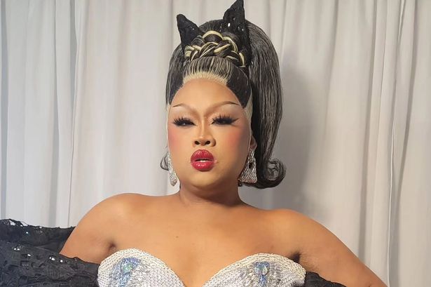 Bianca Castro, also known as Jiggly Caliente, in a black dress.