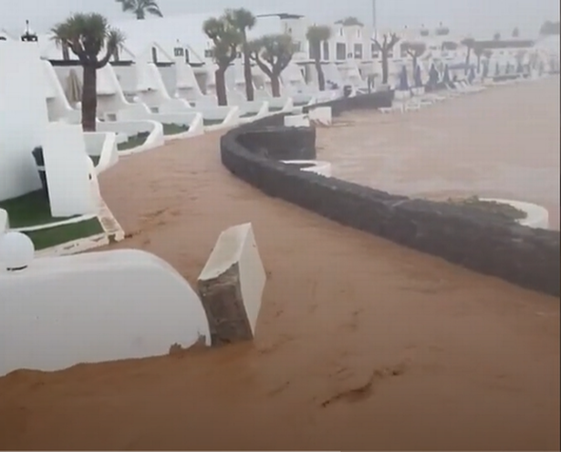 Flood waters approaching an apartment complex in Lanzarote. 