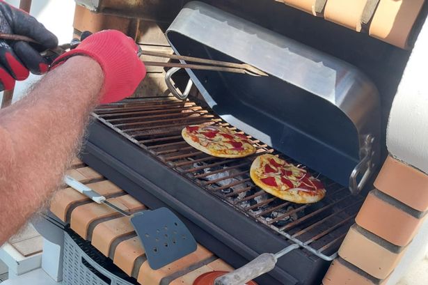 Teresa and Gary Bickley were forced to cook pizza on their barbecue due to the widespread loss of power in western Europe yesterday