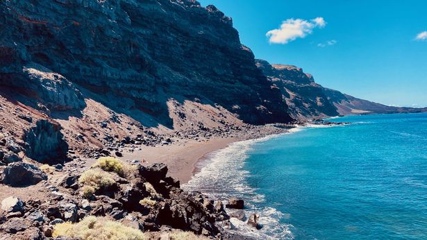 Shot of El Hierro coastline, showing rocky cliffside and sea