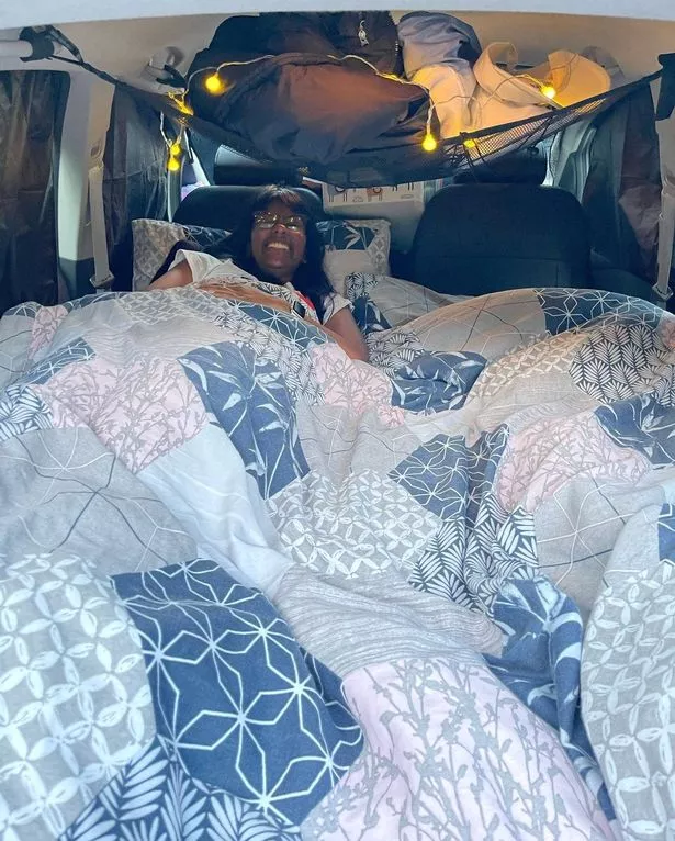 Ashla Prakash in the back of the Corsa
