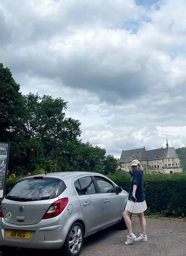 Madeleine Jaye with her trusty Corsa