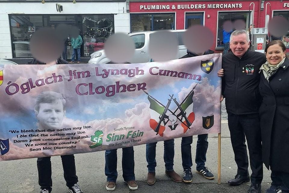 Sinn Fein councillor Eugene McConnell alongside party leader Mary Lou McDonald next to a banner honouring Jim Lynagh