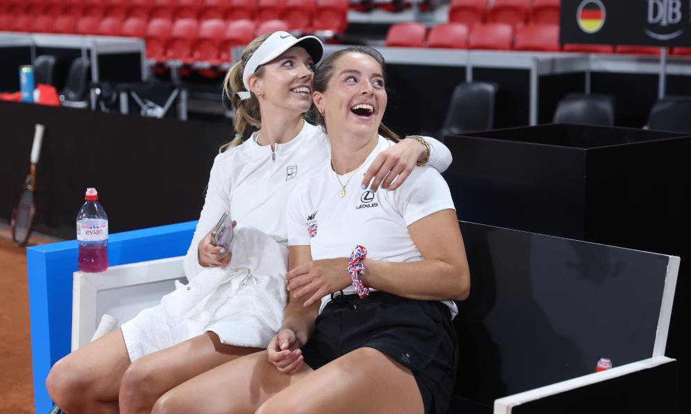 Katie Boulter and Jodie Burrage look behind them and laugh