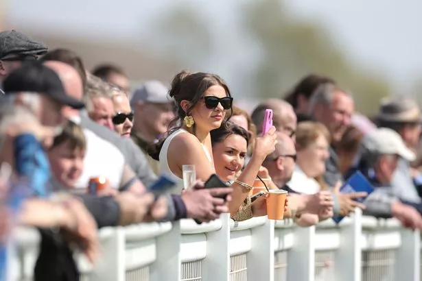 Racegoers at Ayr for the Scottish Grand National festival