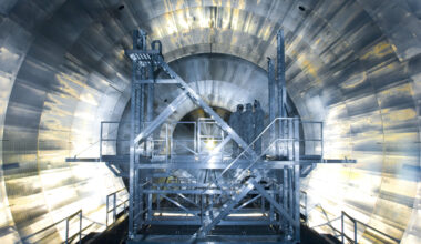 New experiment halves weight limit of elusive neutrinos