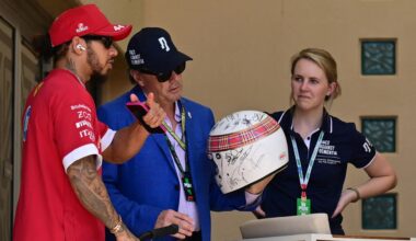 Michael Schumacher signs helmet to be worn by fellow F1 champion at Bahrain Grand Prix