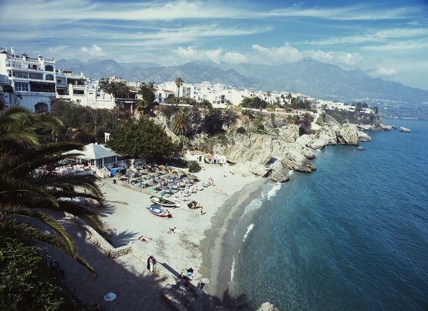 Spain, Andalucia, Malaga, Nerja, coastal cityscape and beach