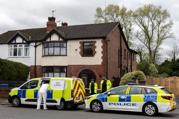 Police and forensics at the home on Altrincham Road, Gatley, Stockport
