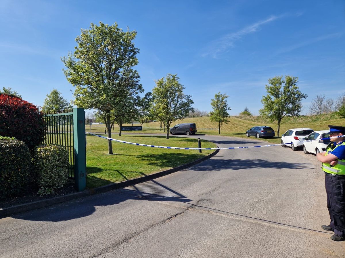 A sign for Aston Wood Golf Club in Birmingham