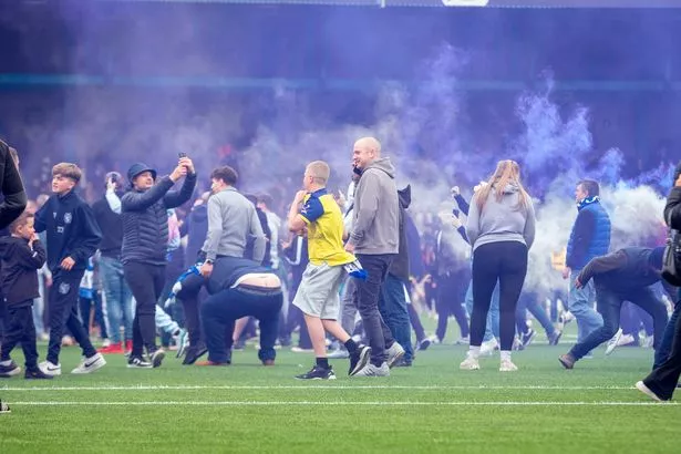 Tears, flares and celebrations on the pitch.