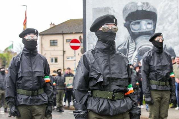 New IRA parade: Police attacked with petrol bombs as masked men march through Derry on Easter Monday