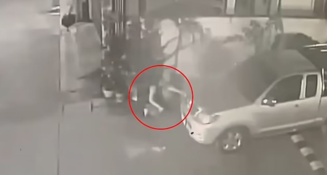 Horror moment woman gives birth behind a car during street festival before leaving newborn to die as she parties on