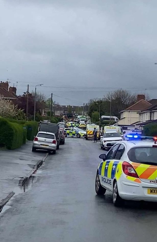 Police pictured at Queenshill Road on Friday, April 18