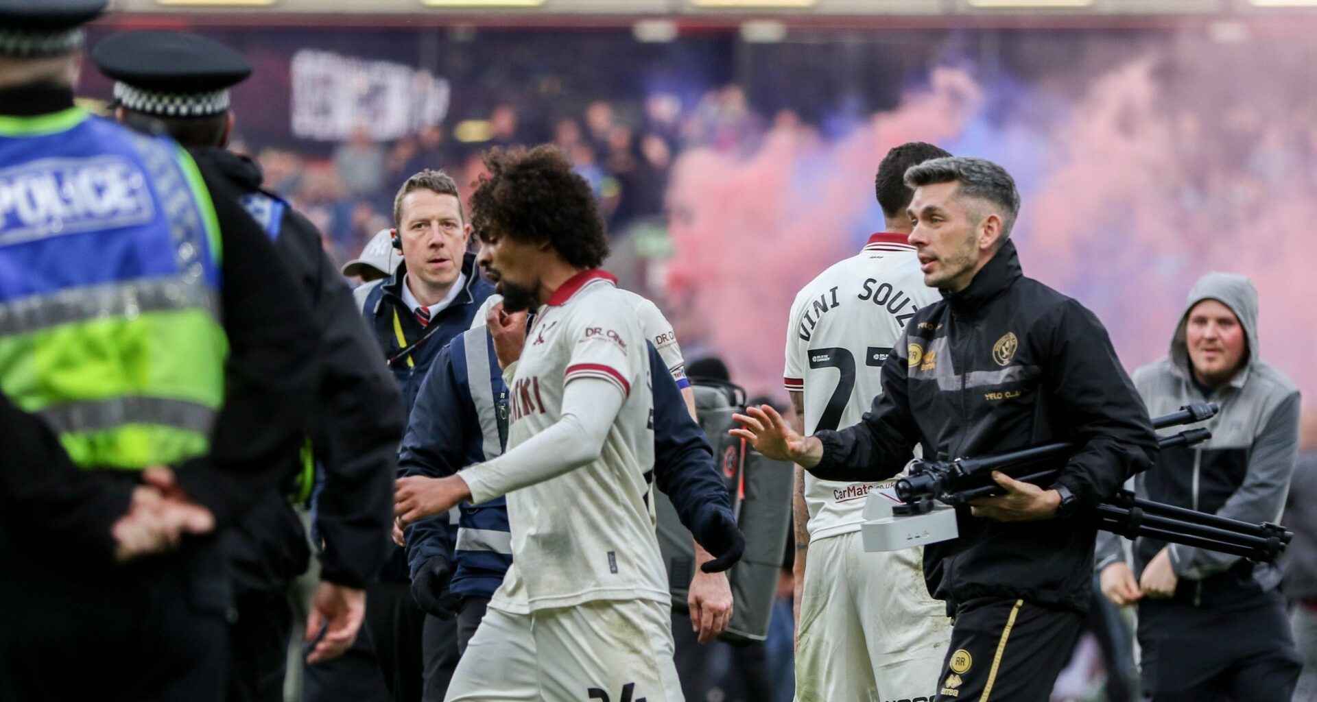 'Was quite scary' - EFL boss fumes as players goaded by pitch invaders in ugly scenes