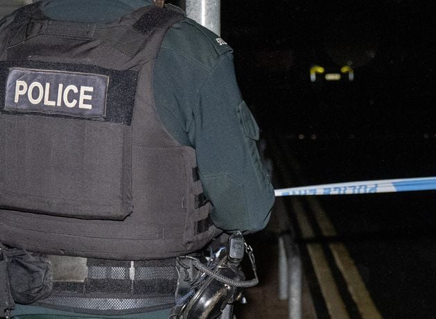 Masked man makes off with cigarettes, cash and alcohol following robbery in Belfast