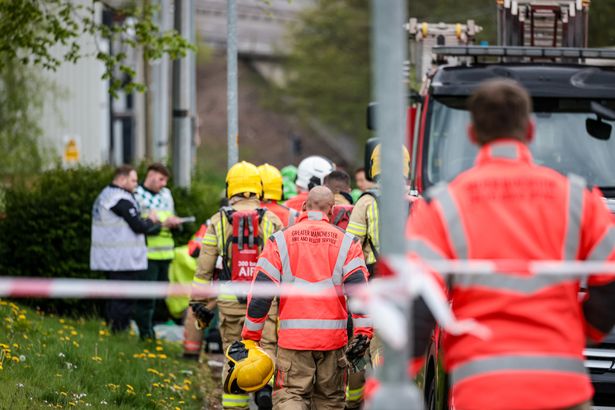 Police and specialist emergency services attend the scene of a chemical explosion on West End Street, Oldham.