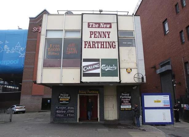 The Liverpool Royal Court Theatre next to The New Penny Farthing pub in Liverpool City Centre