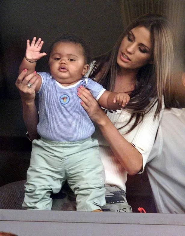 Katie Price with her son Harvey Price as a baby at his father Dwight Yorke's match in March 2003
