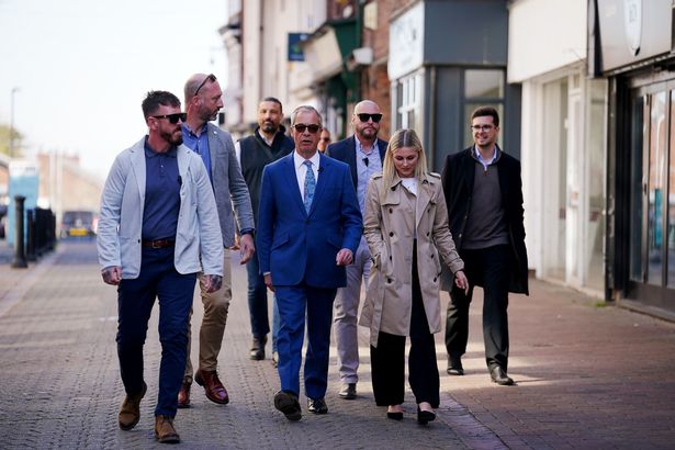 Reform UK leader Nigel Farage during a walkabout in Ormskirk, Lancashire, whilst on the local election campaign trail. Picture date: Wednesday April 9, 2025. PA Photo. See PA story POLITICS Reform. Photo credit should read: Peter Byrne/PA Wire