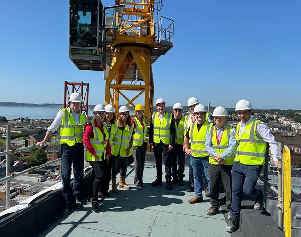 Hacer Developments team on the building roof