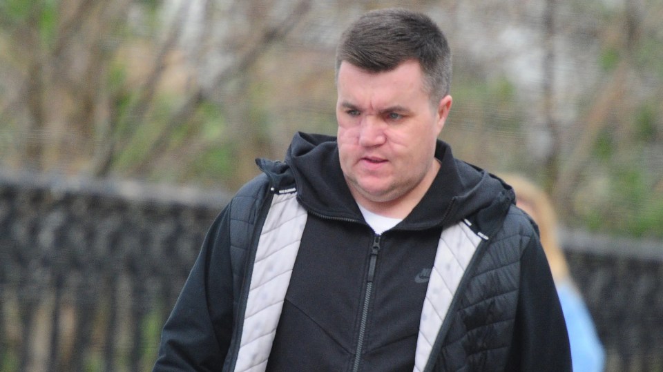 Steven "Bonzo" Daniel, a member of the Daniel crime clan, walking outside.